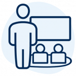 An icon of a teacher with children on a rug in front of a whiteboard.