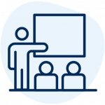 An icon of a person pointing to a whiteboard in front of a crowd.