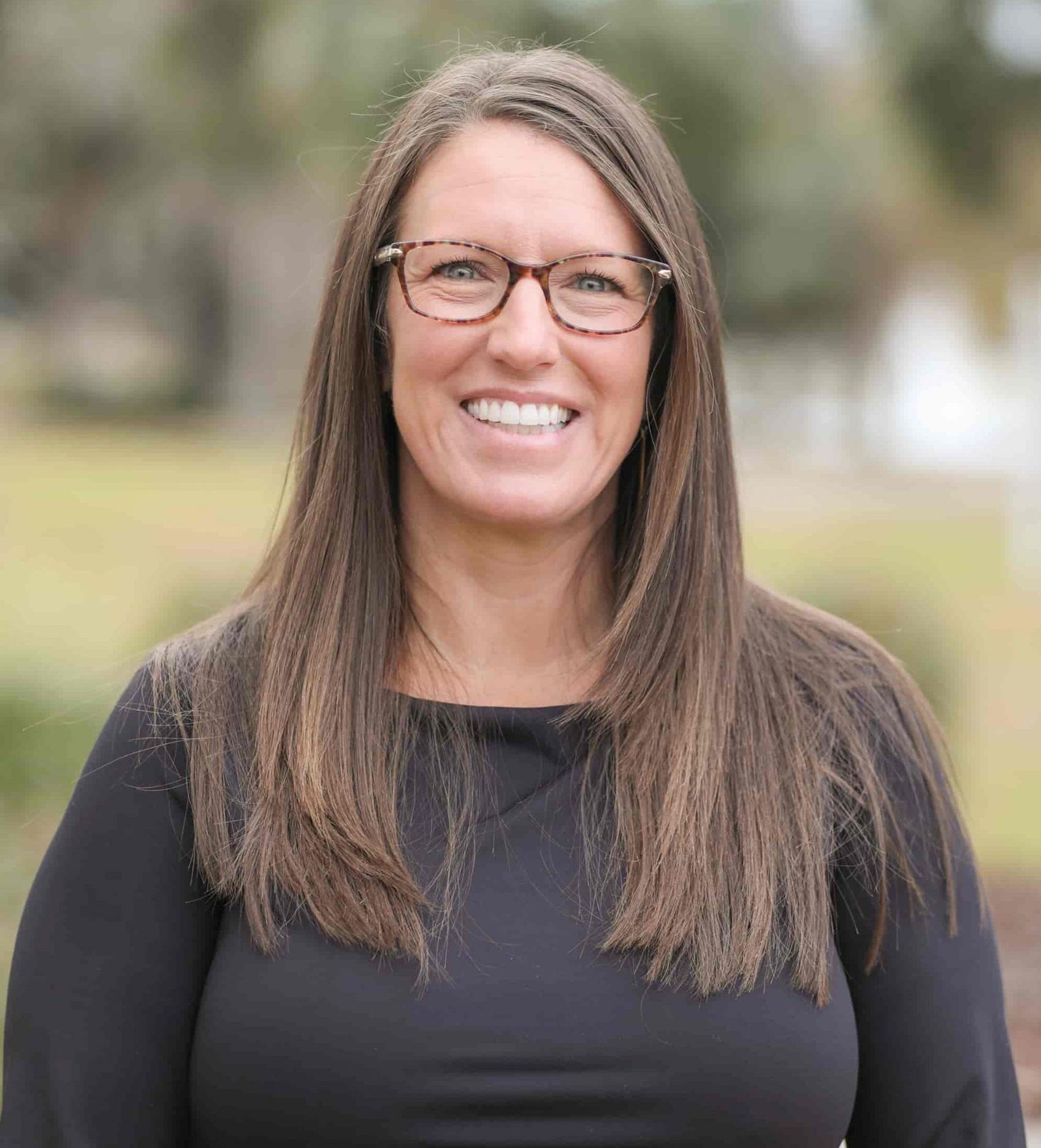 A headshot of Christina Flake.